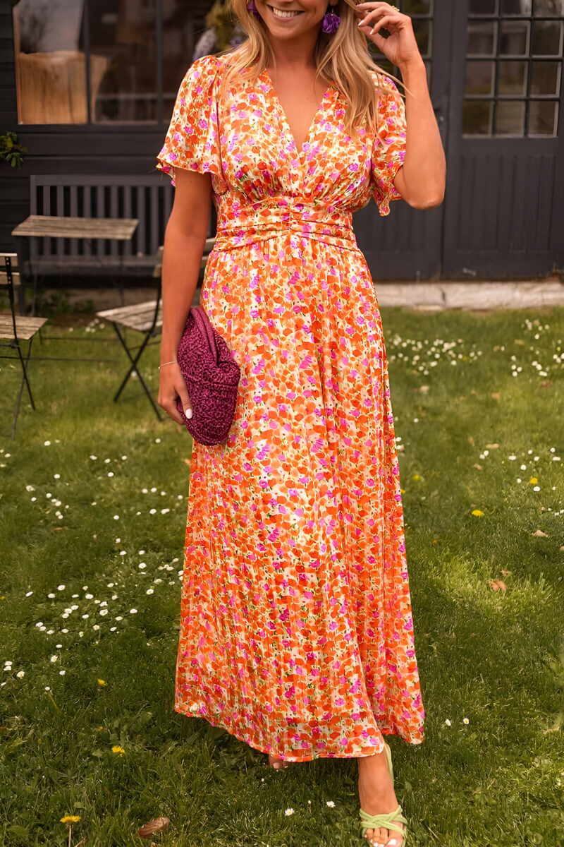 Elegantes Blumen-Maxikleid – Luftig, Farbig & Figurschmeichelnd