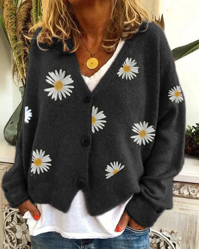 Gebloemd vest met één rij knopen