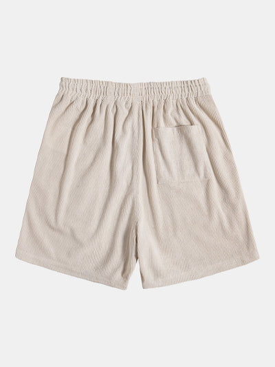 Kurzärmeliges Hemd aus Samt und Shorts mit Knopfverschluss.