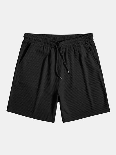Strickpolo mit seitlichem Reißverschluss und Shorts