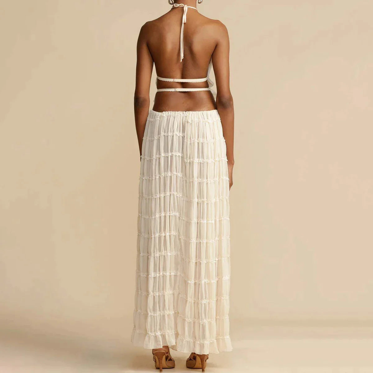 Top met halternek &amp; halflange rok
