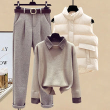 Grauer Pullover Graue Hose und weiße Weste