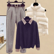 Schwarzer Pullover graue Hose und weiße Weste