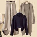 Schwarz Pullover Aprikosenfarbene Hose und Aprikosenfarbener Blazer