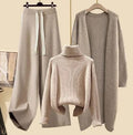 Aprikosenfarbener Pullover aprikosenfarbene Hose und aprikosenfarbener Blazer